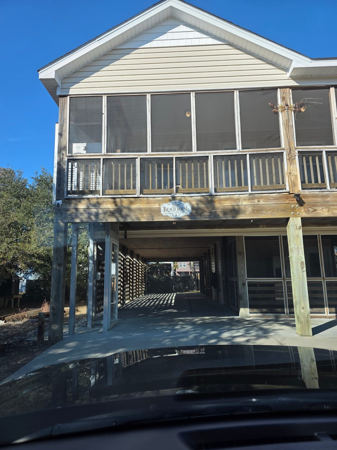 Customer photo review of Beach House Metal Sign