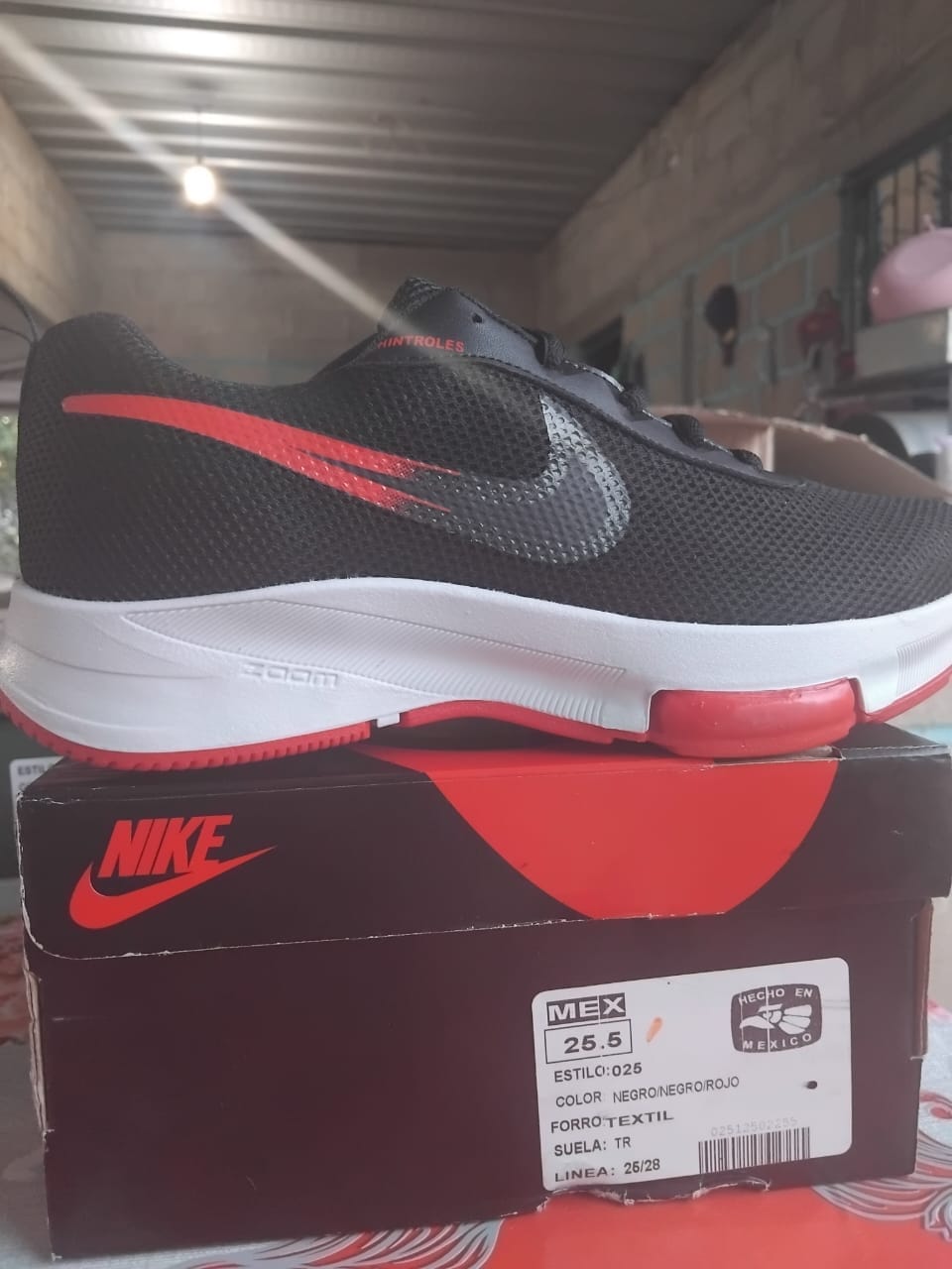 Customer photo review of Tenis 025 Negro Negro Rojo