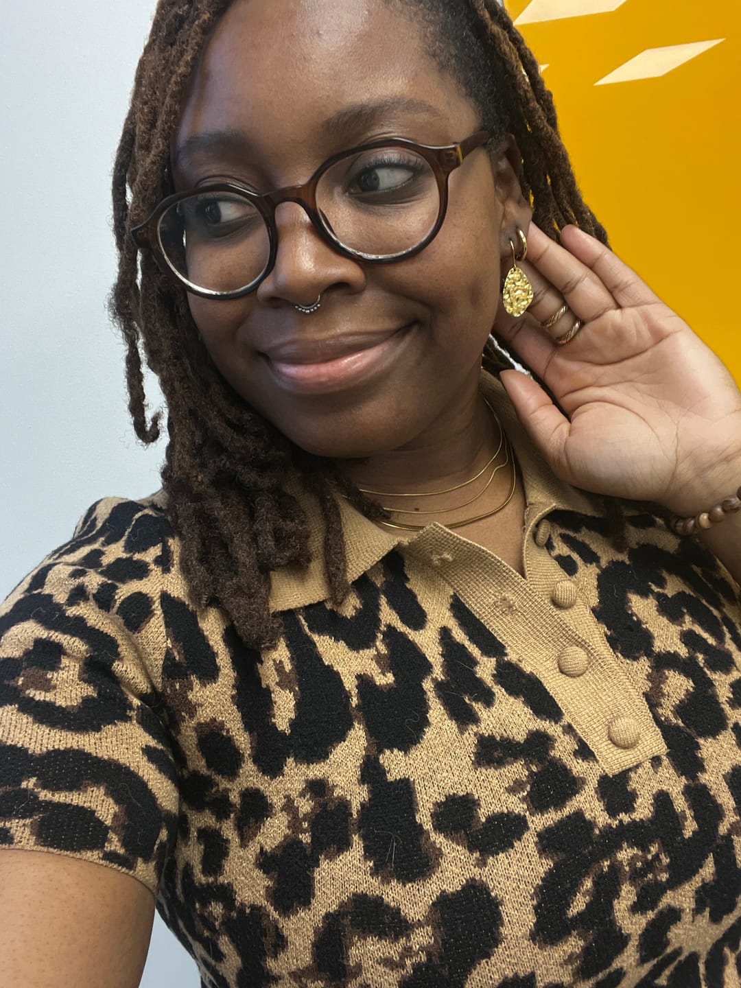 Customer photo review of Amaya Hammered Gold Drop Earrings