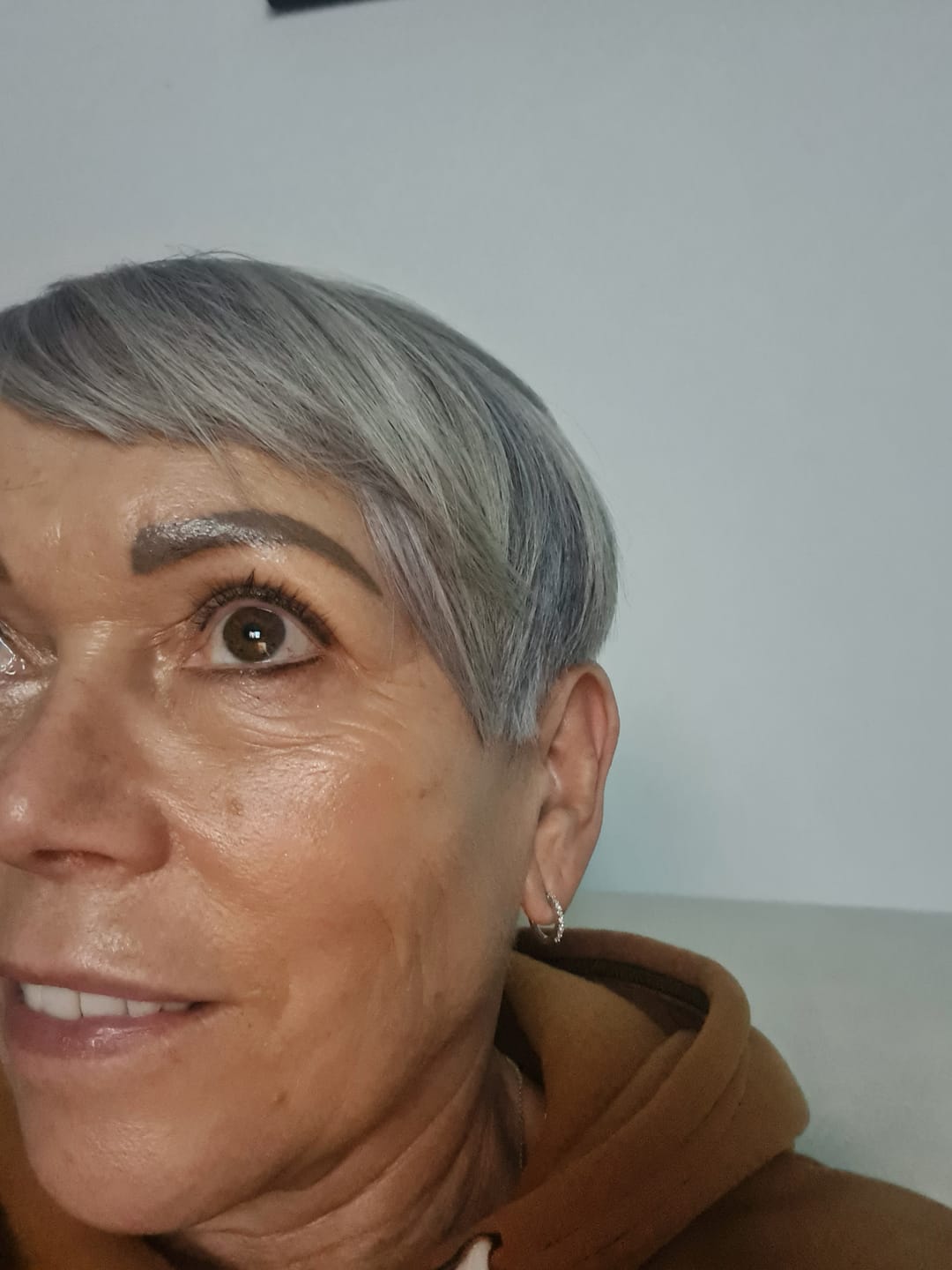 Customer photo review of Versa Single Spark Lab Grown Diamond Huggies Hoop Earrings