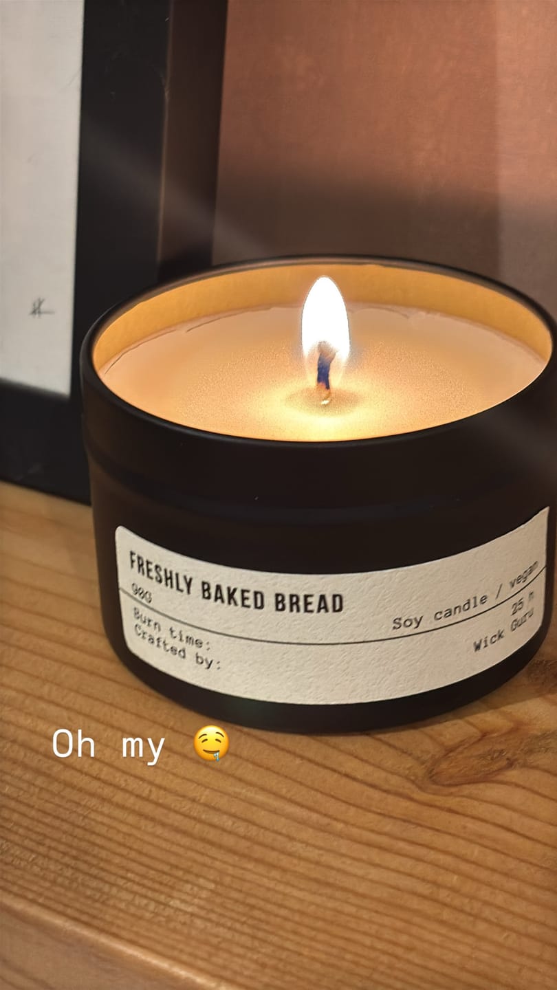 Customer photo review of Vintage Bookshop Candle | Pepper + Violet + Patchouli