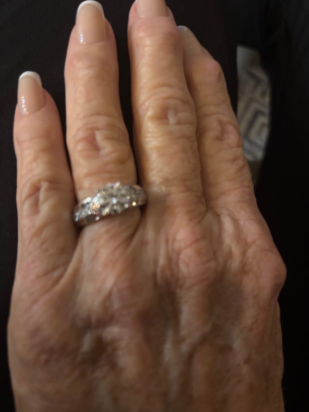 Customer photo review of Moissanite With Channel Set Sapphire Accents Engagement Ring