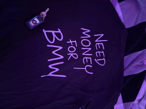 Customer photo review of NEED MONEY TEE