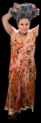 Customer holding up their Shake N Go Natural Me Drawstring Ponytail against a black background.