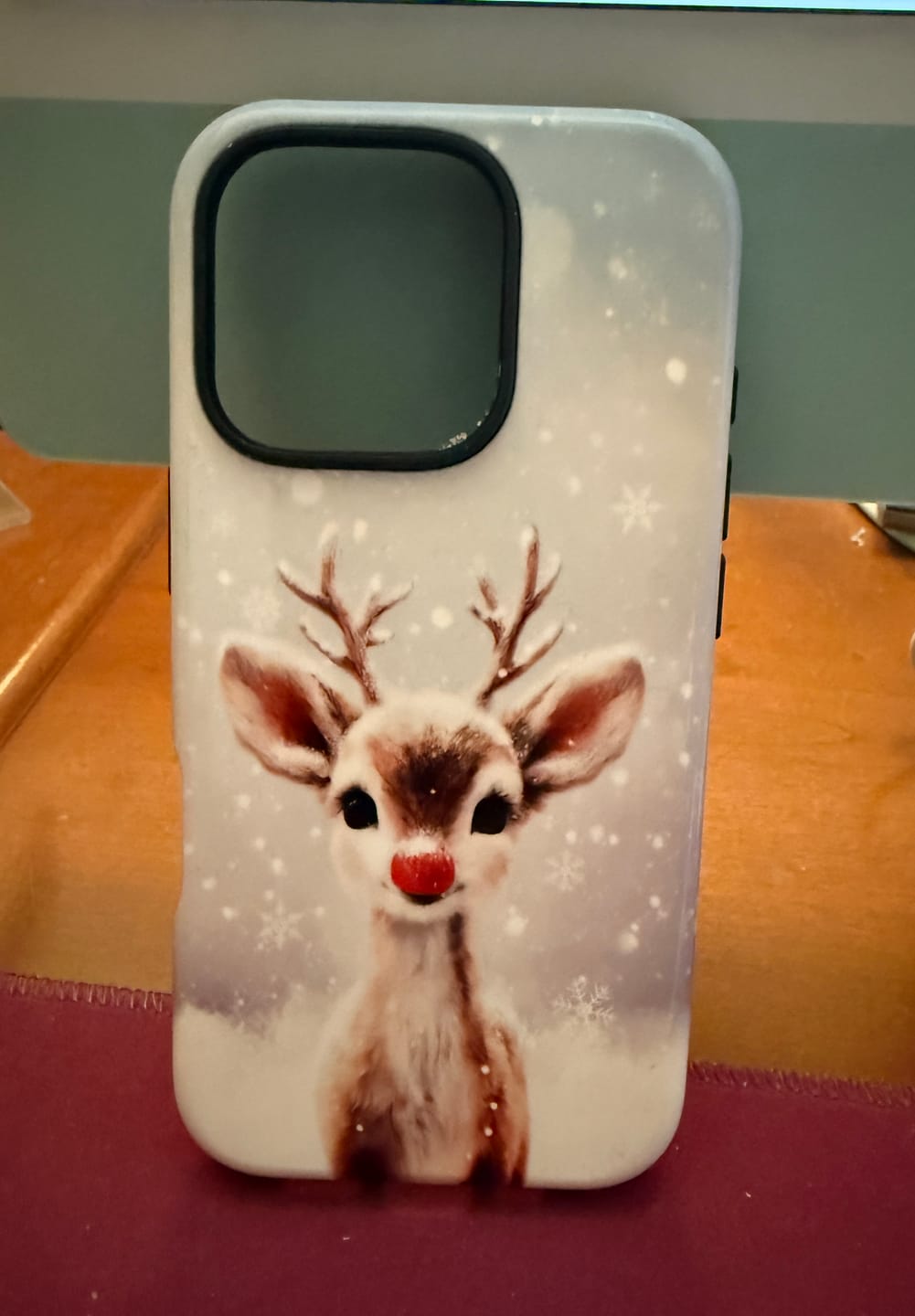 Customer photo review of Rudolph’s Glow Design iPhone Case