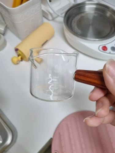 Customer photo review of Taza medidora de vidrio resistente al calor con doble boquilla, taza de café de vidrio de alto borosilicato, taza de transferencia de café expreso de 75ml, taza de leche