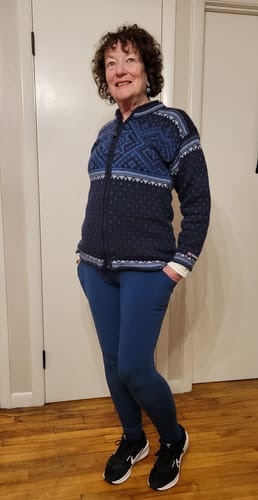 Reviewer standing indoors wearing the Majolica Blue Piper Pocket Leggings with hands in the side pockets.