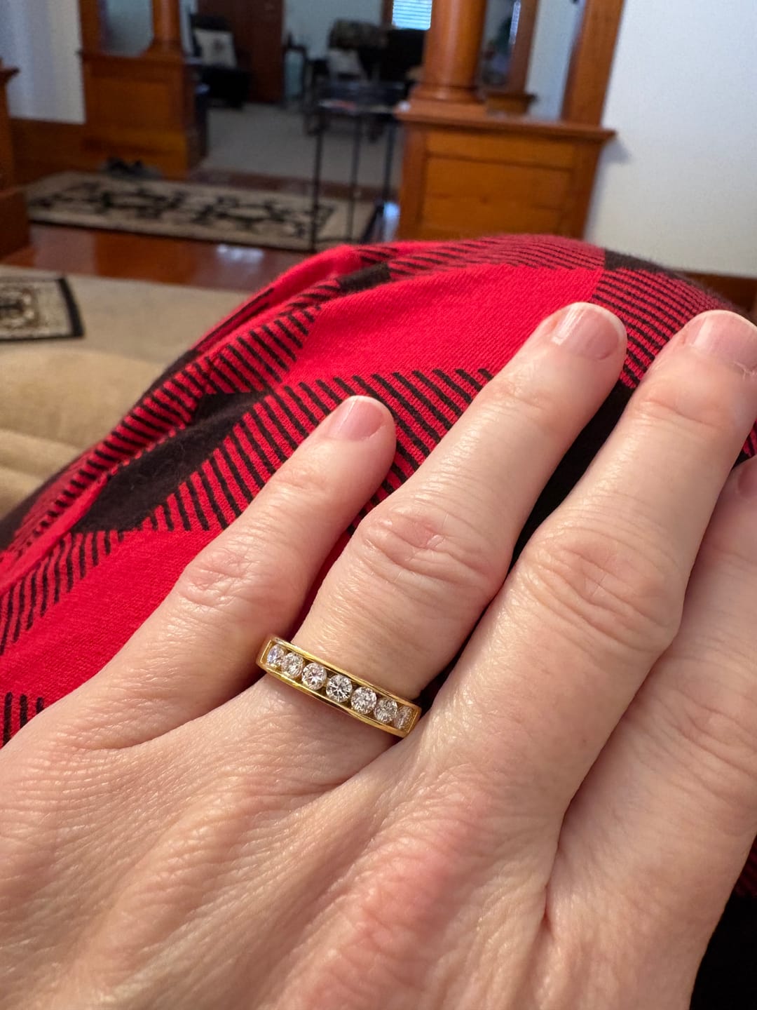 Customer photo review of Channel Set Moissanite Half Eternity Wedding Band Ring In Sterling Silver