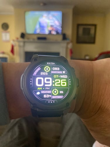 Customer's Gard Pro smartwatch on their wrist, showing the bright digital display with time and health stats.