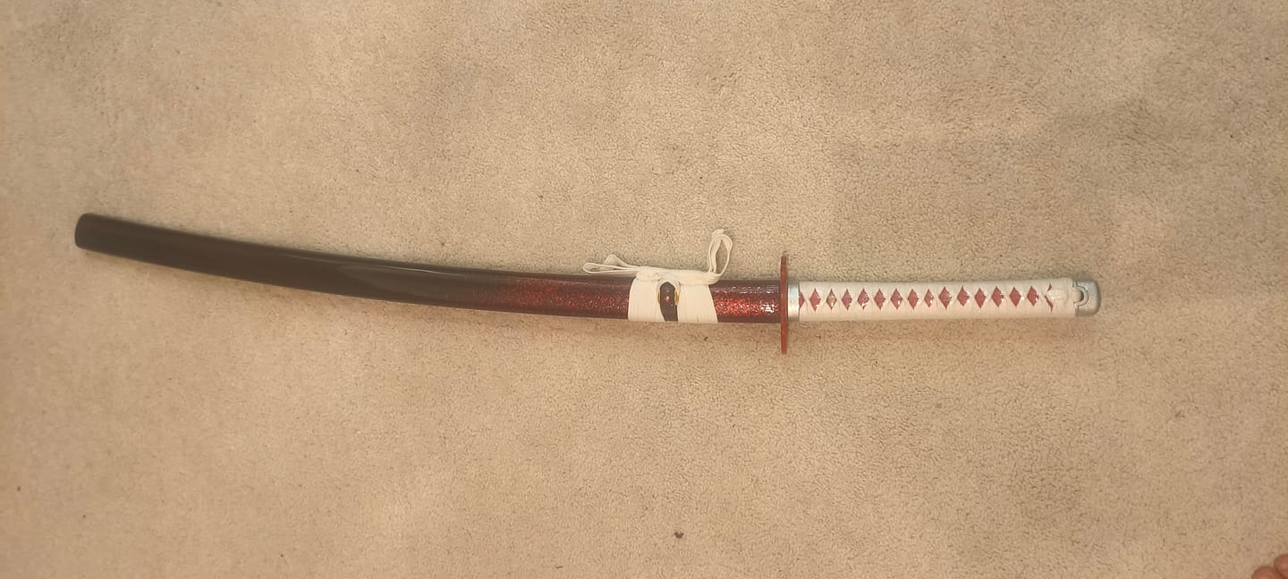 Customer photo review of The Rengoku Kyojuro2 Handmade Katana Manganese Steel From Demon Slayer