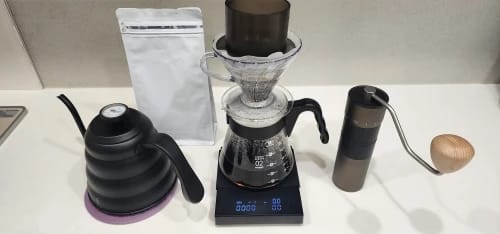 Customer photo review of TIMEMORE Gotero de agua SimpleDrip con tapa, 13 agujeros para descarga uniforme de agua, mantiene un flujo constante y estable de agua