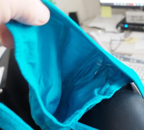 Customer's close-up view of the blue Modal Thong, showing the internal supportive pouch.