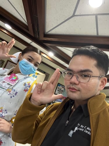 Customer photo review of Zip-Up Polo MoveTech® Scrub Top - Men / Merlot