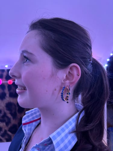 Customer photo review of Ellica Blue Gold Droplet Huggie Earrings