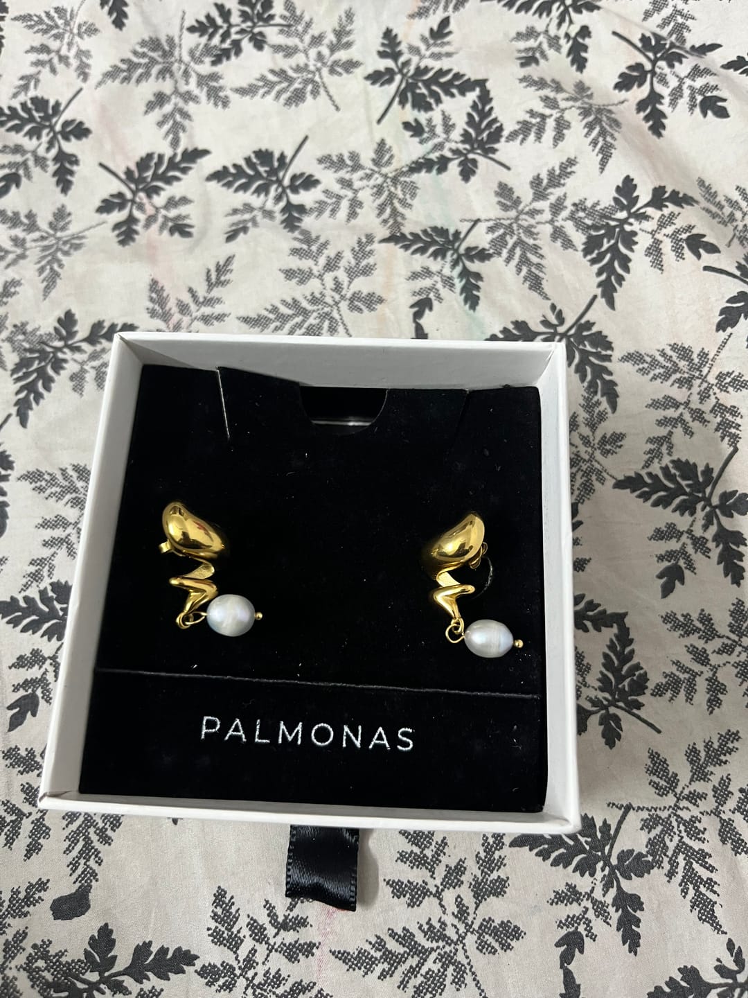 Customer photo review of Bolt Pearl Twist Drop Earrings