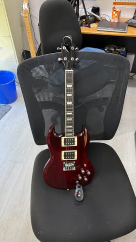 Customer photo review of PIONEERTCR Flight Pioneer Tenor Ukulele Transparent Red Steel String Solid Body Electric Ukulele with Deluxe 20mm padded gig bag.