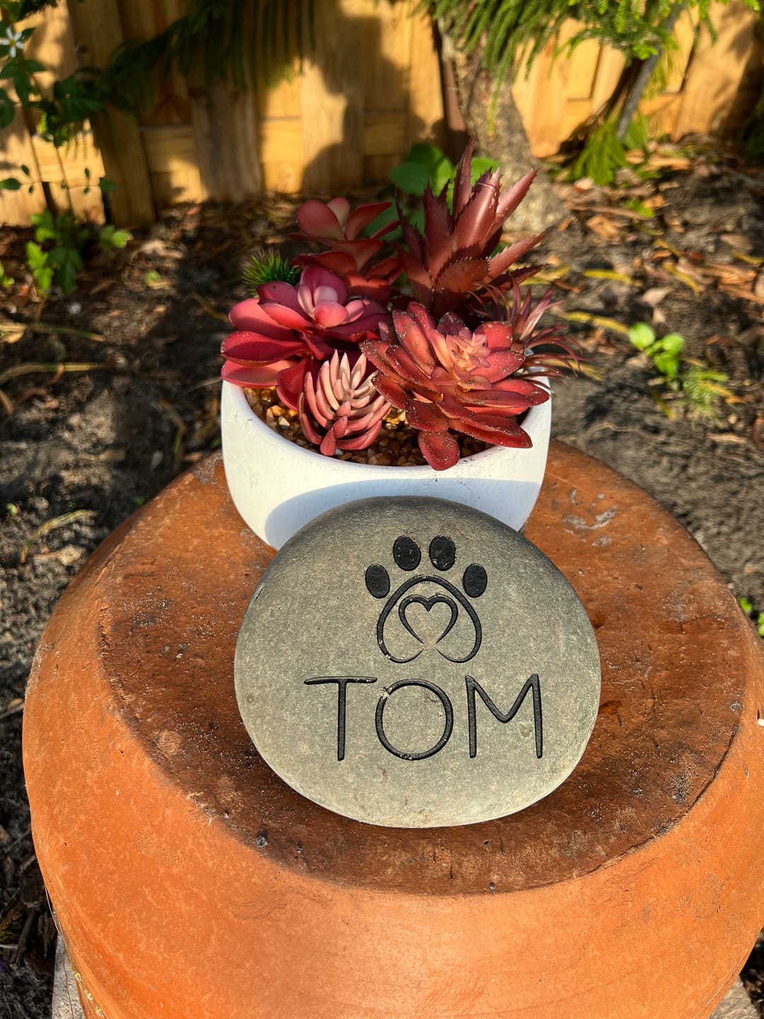 Customer photo review of Dog headstones Grave Marker Custom Engraved Pet Memorial River Rock Stone Heart Paw Print
