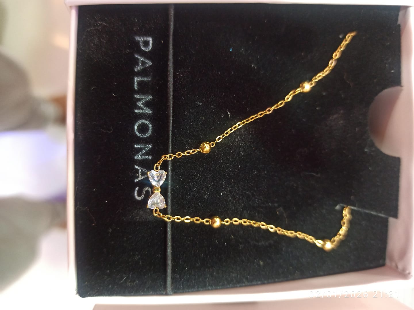 Customer photo review of Dainty Crystal Bow Necklace