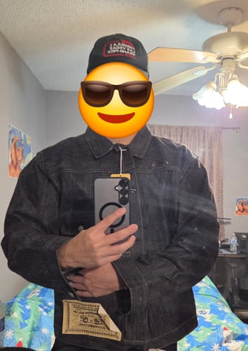 Customer takes a mirror selfie wearing the dark 1947 Type 1 Selvedge Denim Jacket.