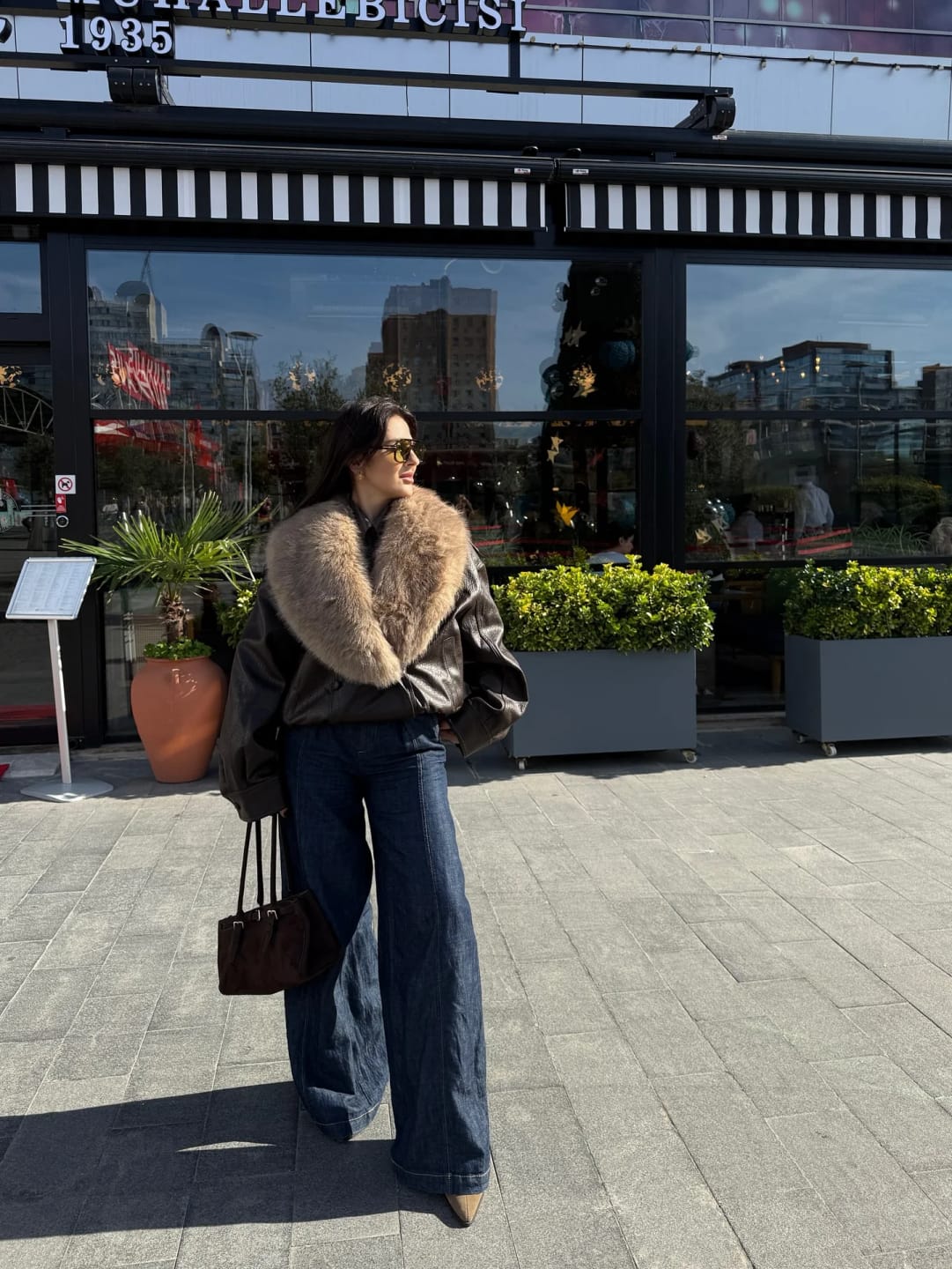 Customer photo review of Merriame Faux Leather Jacket with Detachable Fur Collar