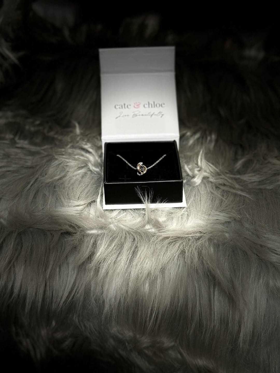 Customer photo review of Ashley 18k White Gold Plated Knot Pendant Necklace