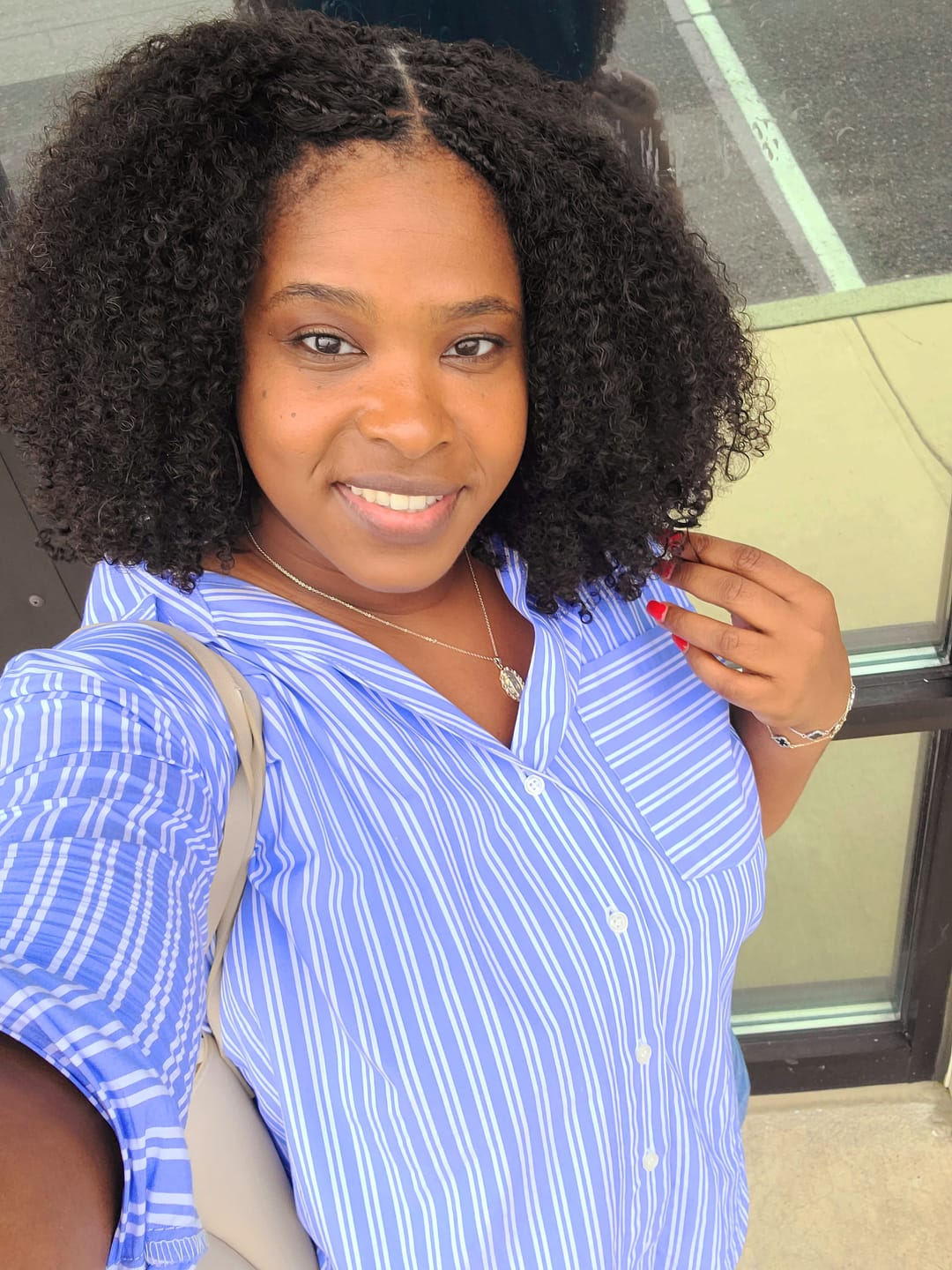 Customer photo review of Multi-Textured Kinky Curly Bulk Hair Extensions for Braiding