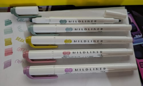 Customer's five new Zebra Mildliner Highlighters swatched on paper to show the muted colors.