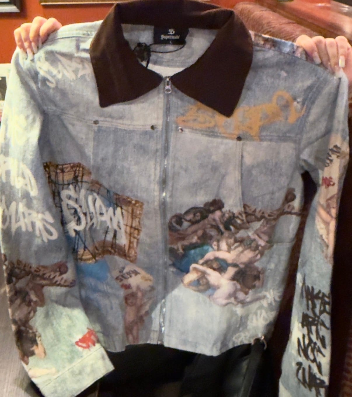 Customer photo review of Artistic Patches Graphic  Distressed Denim Jacket