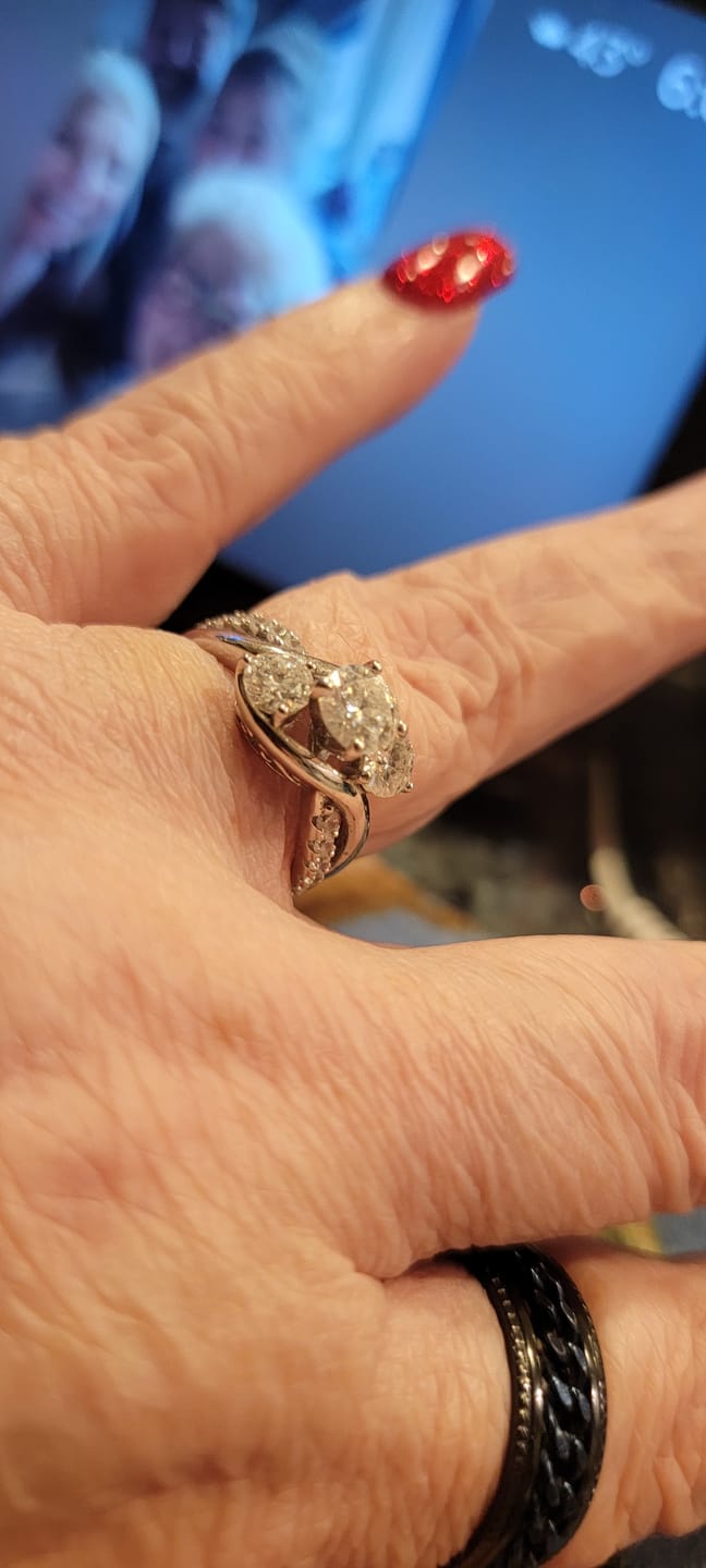 Customer photo review of Swirl Three Stone Moissanite Twisted Pave Engagement Ring