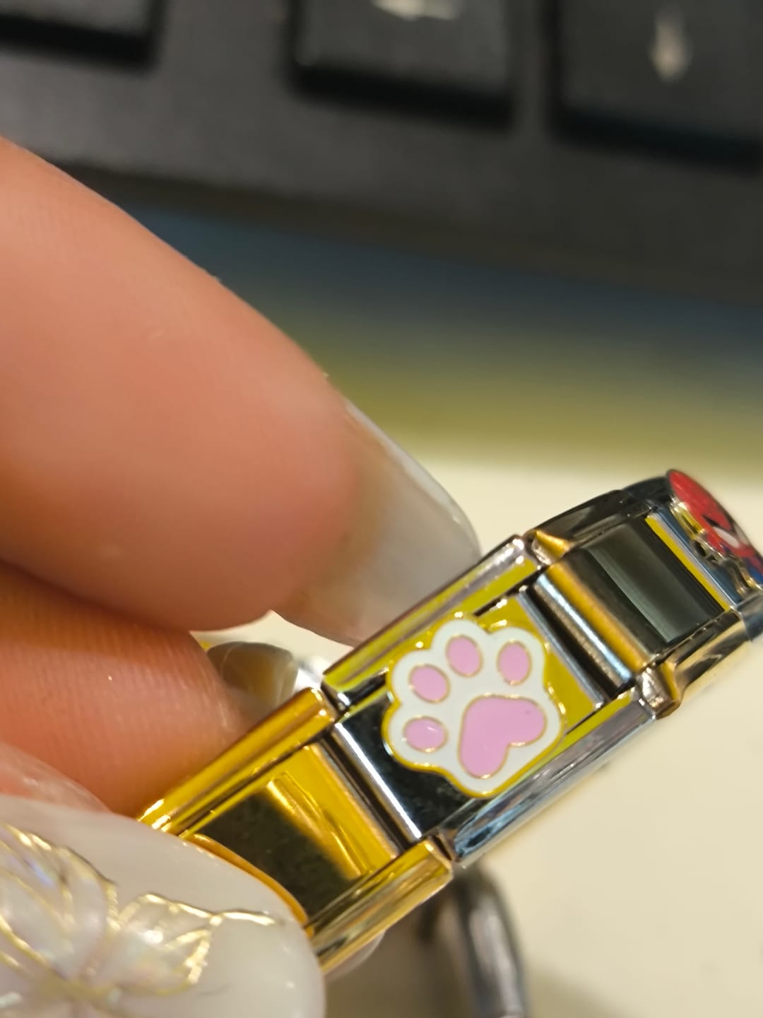 Customer photo review of Charm Huella rosa