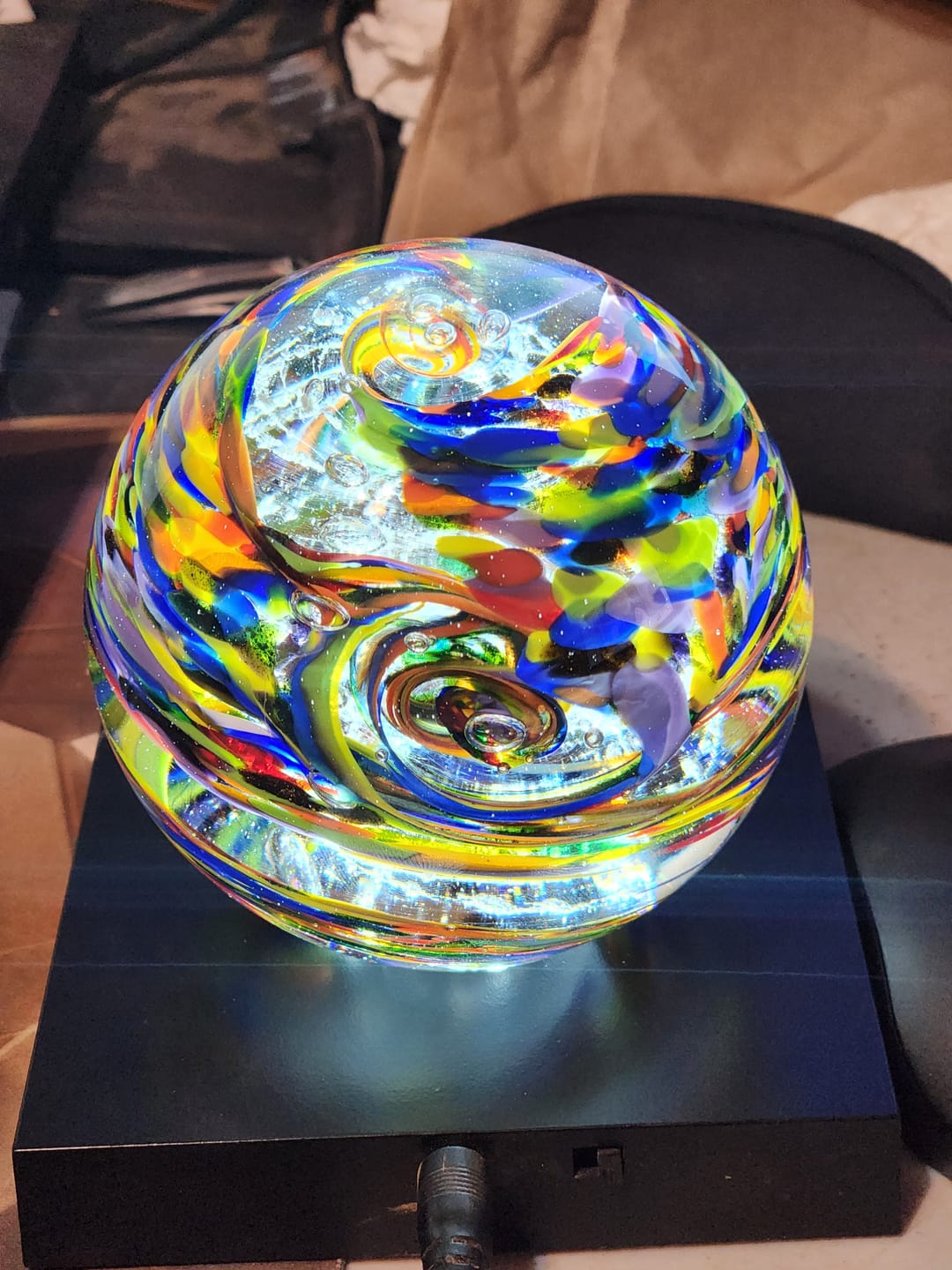 Customer photo review of Rainbow Confetti Orb with Cremation Ashes