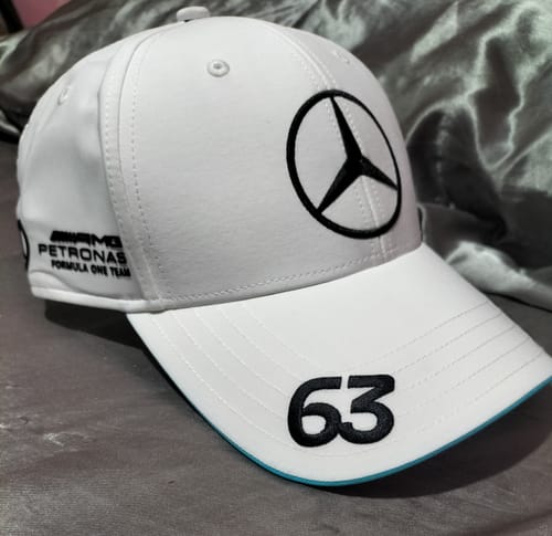Customer's white adidas George Russell cap with the Mercedes logo and number 63 on the brim.