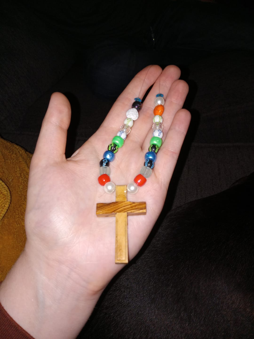 Customer photo review of Holy Land Plain Olive Wood Cross Pendant