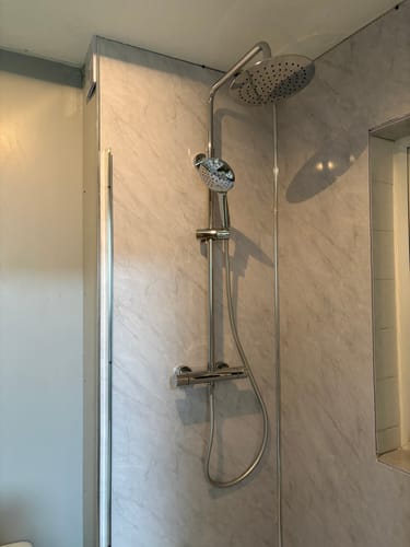 Customer photo review of Premium Grey Marble Gloss Shower Wall Panel – 1M x 2.4M