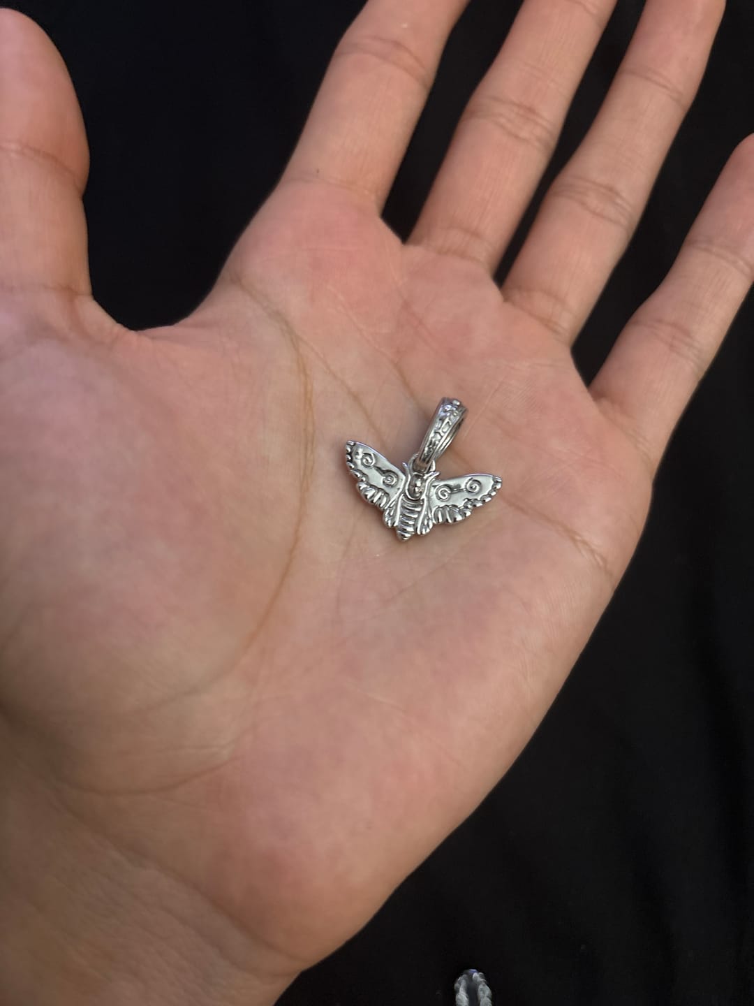 Customer photo review of MOTH PENDANT