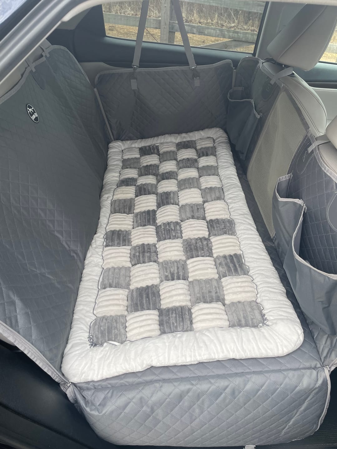 Customer photo review of Plush Backseat Dog Bed (Made For The Hard Bottom Car Seat Cover)