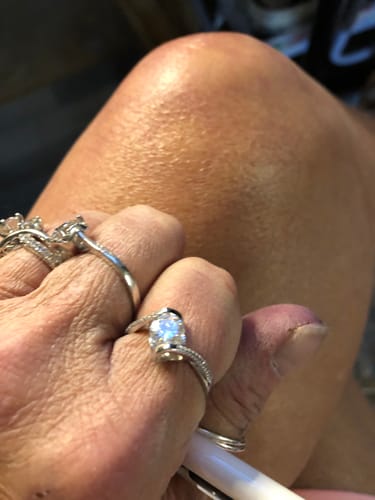 Customer photo review of Angel kiss Round Moissanite Sterling Silver Ring