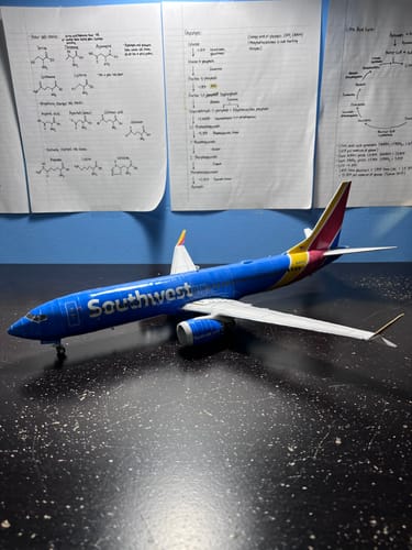 Customer's model airplane with a glossy, protective coat of Maker's Magic Gloss, seen from the side.