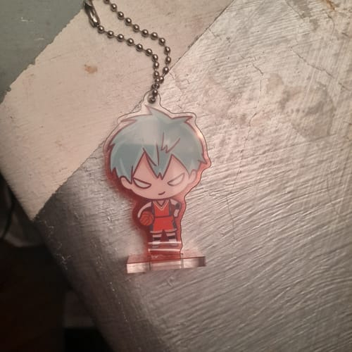 Reviewer's Alien Stage Sport Series acrylic stand keychain of a blue-haired character in a basketball uniform.