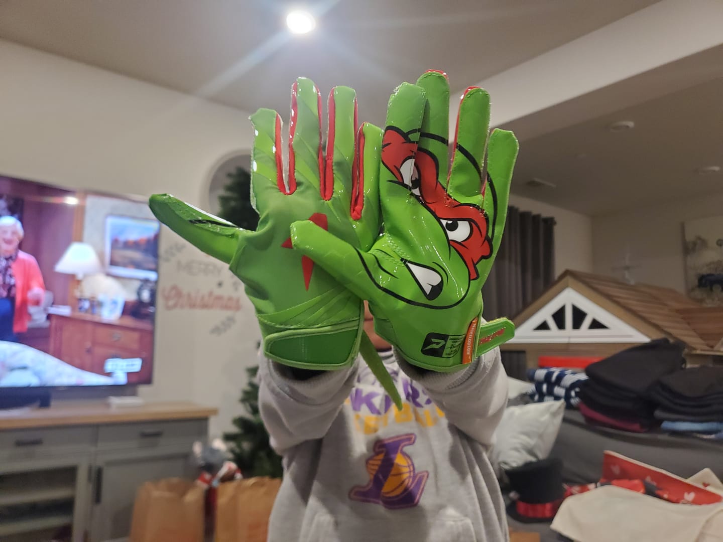 Customer photo review of Ninja Turtles: Raphael Football Gloves – VPS5 by Phenom Elite