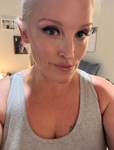 Reviewer's close-up selfie showing smooth, radiant skin after using the Tallow & Honey Balm.