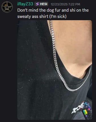 Close-up of a reviewer wearing the silver 4MM Mini Cuban Chain around their neck against a black shirt.