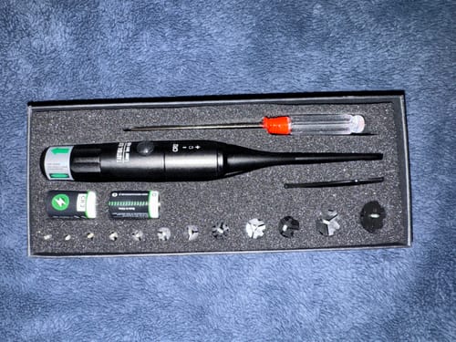 Customer's Site Right™ 2.0 - Boresighter kit in its open case, showing the tool, batteries, and attachments.