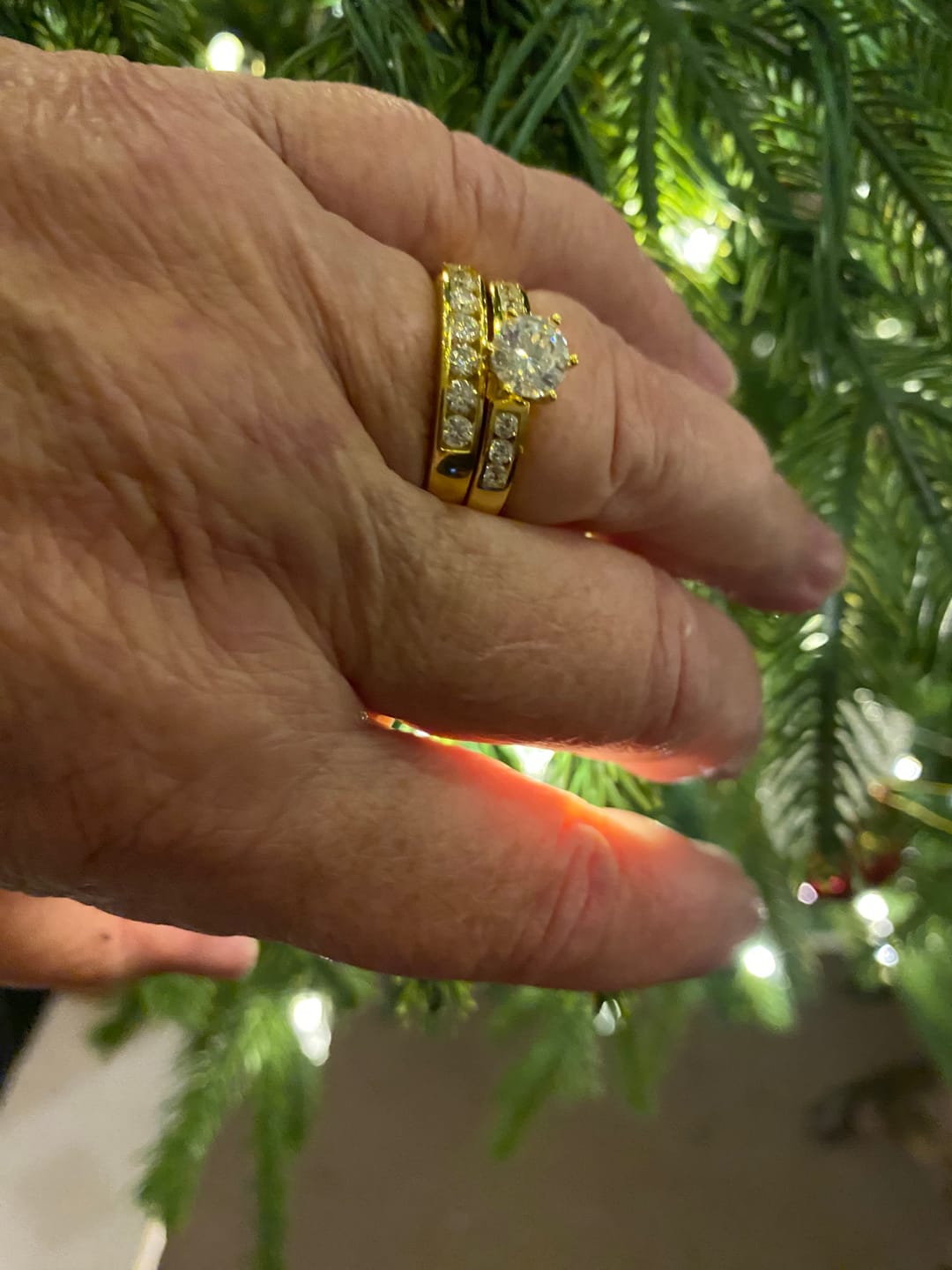 Customer photo review of Round Cut Moissanite Channel Set Engagement Ring