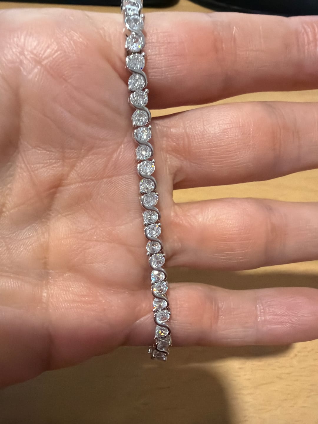 Customer photo review of Ezra 18k White Gold Plated Infinity Tennis Bracelet with Simulated Diamond Crystals
