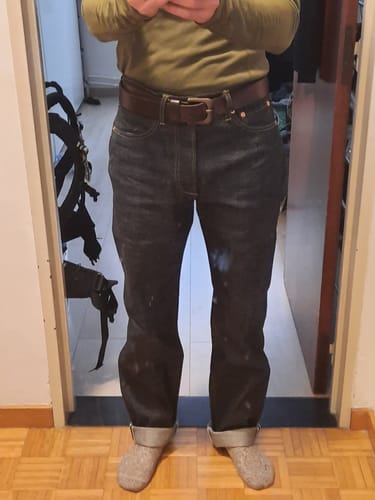 Reviewer wearing dark Heavyweight Selvedge Denim Jeans with cuffed hems, showing the straight-leg fit.