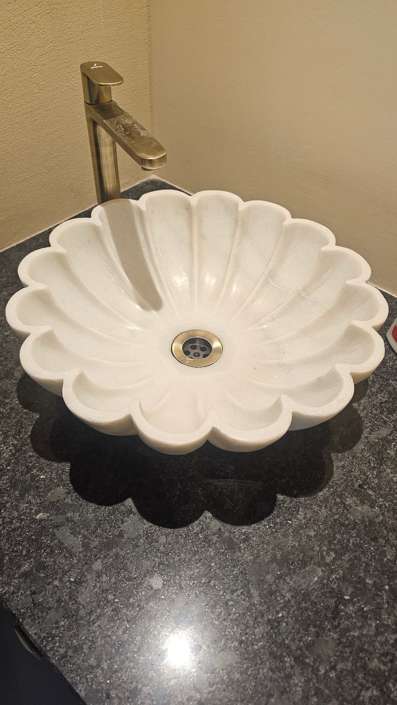 Customer photo review of The Scallop Marble Wash Basin - Hand Carved Fluted Stone Vessel Sink - lehomedecor