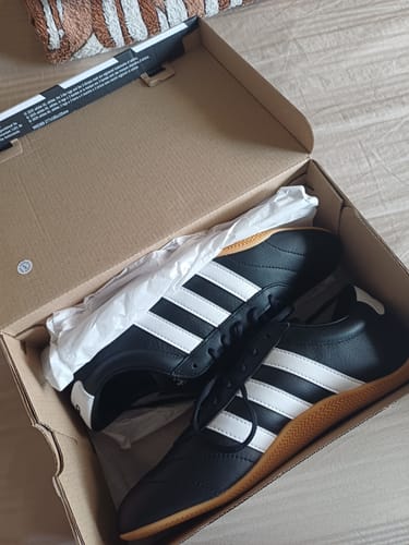 Customer's new adidas Grand Court Lo Casual Shoes in the open box, showing the black leather and gum sole.