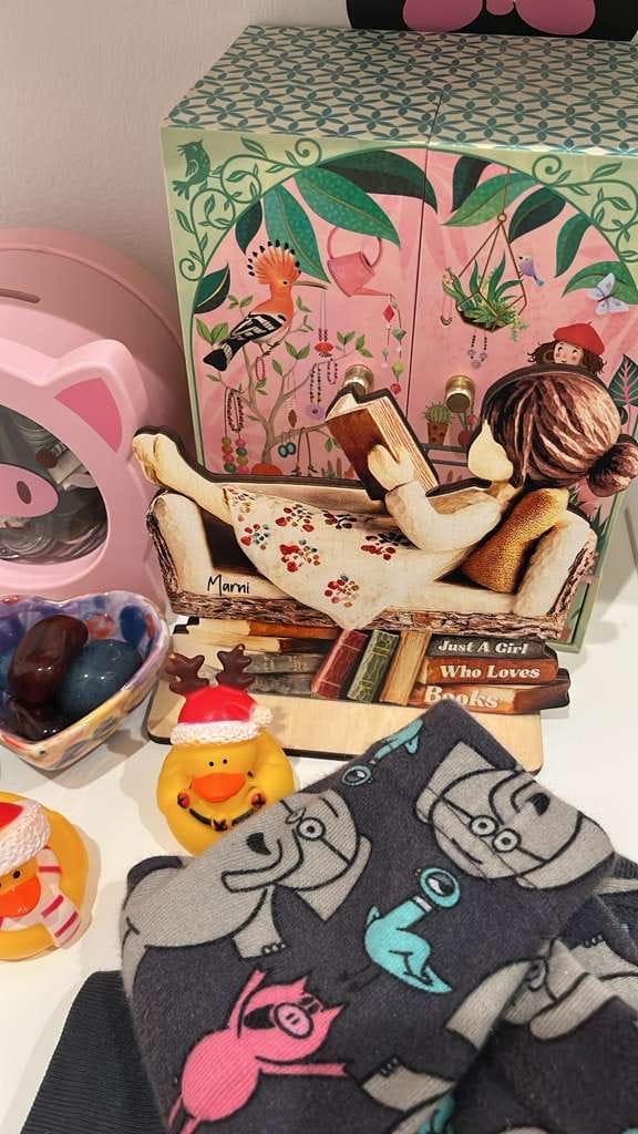 Customer photo review of Man Woman Book Lover Reading Book On Sofa - Personalized Standing Wooden Plaque
