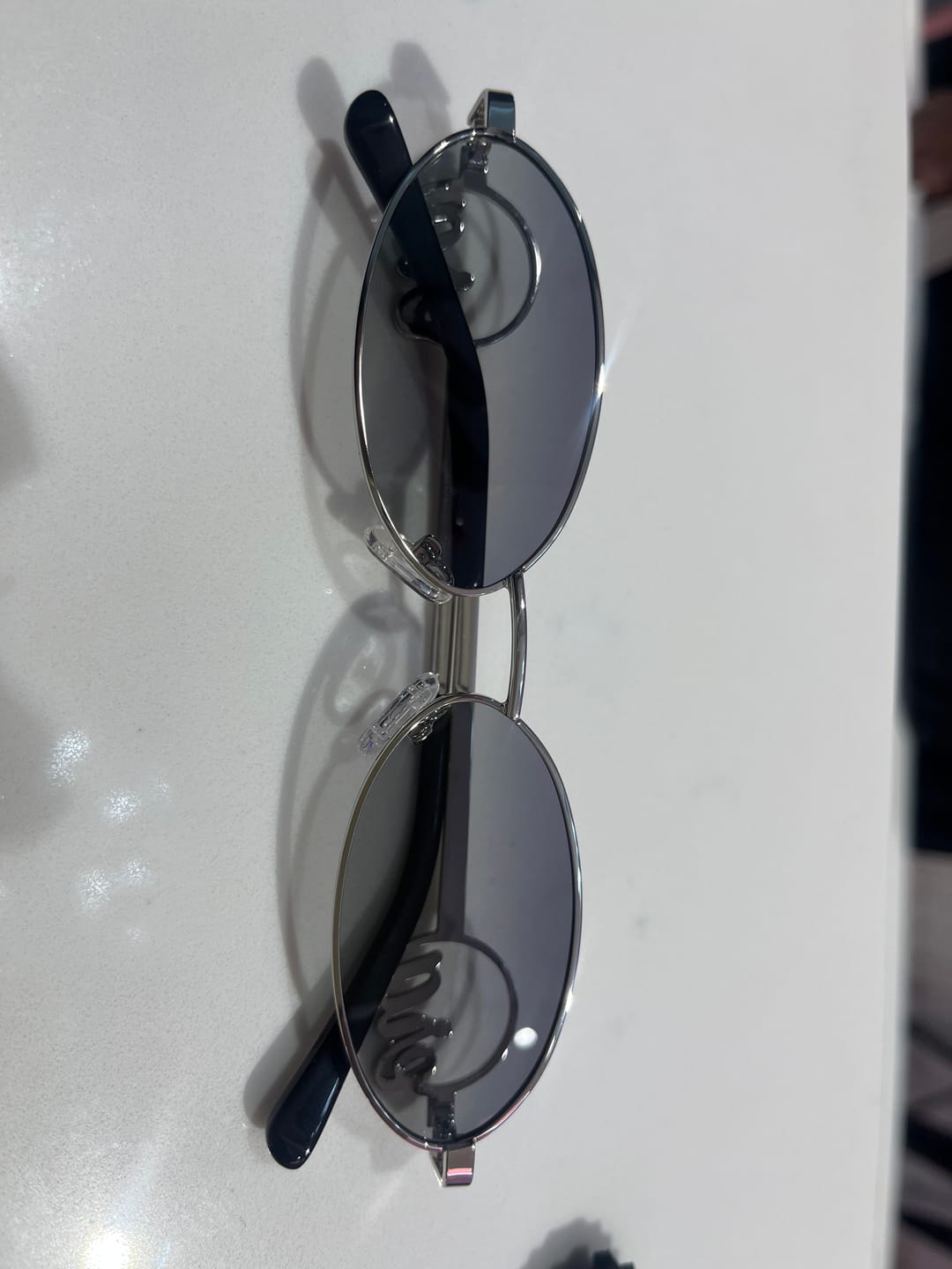 Customer photo review of Muse Logo Sunglasses – Silver Edition